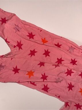 Magnetic Me Pink Star Print Footie with Red & Orange Stars